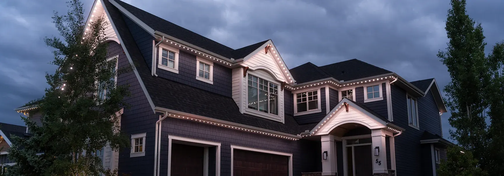 1" Soffit Lights installed and lit on a home at night