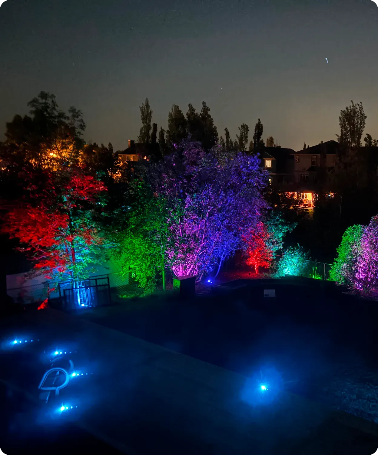 Landscape Lighting installed on a home at night — example 10