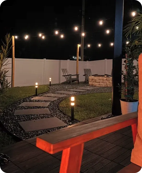 Landscape Lighting installed on a home at night — example 13